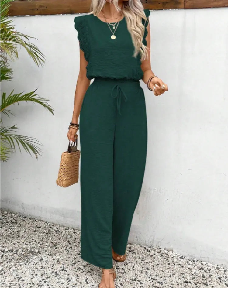 Elegant women's jumpsuit with lace sleeves and wide legs