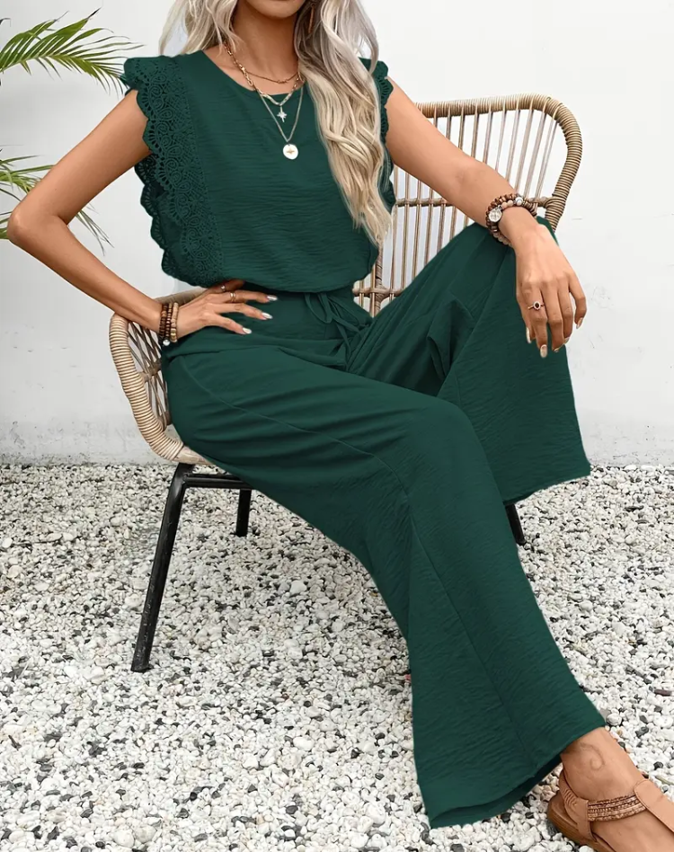 Elegant women's jumpsuit with lace sleeves and wide legs