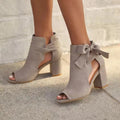 Peep-toe ankle boots with bow detail and block heel